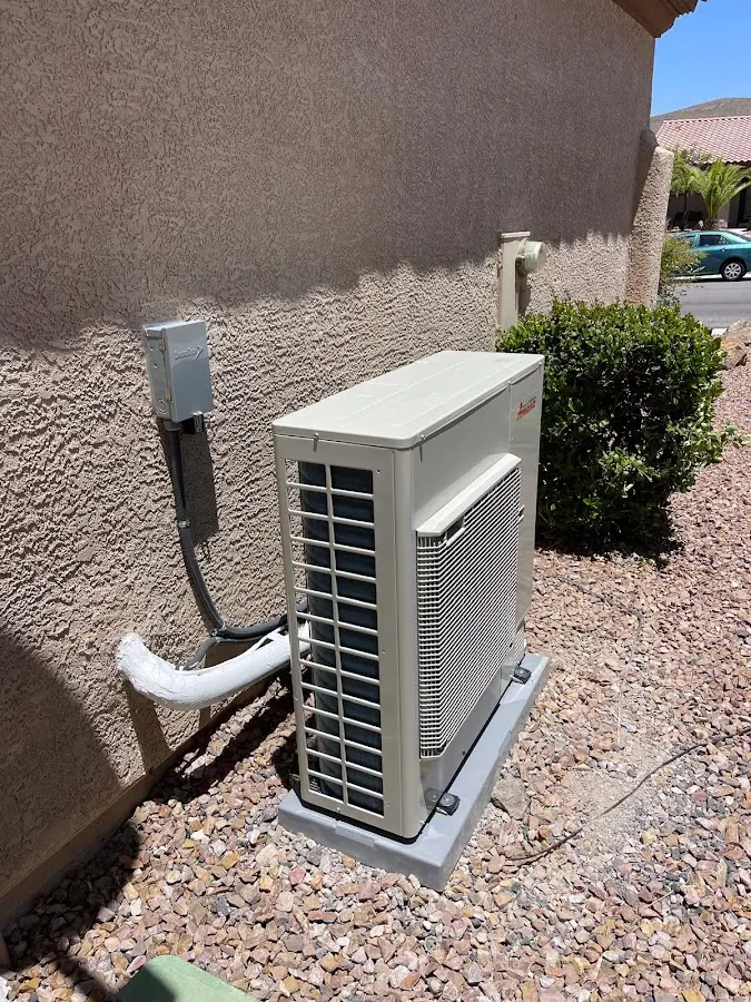 Residential air conditioning condenser unit in Sherrelwood